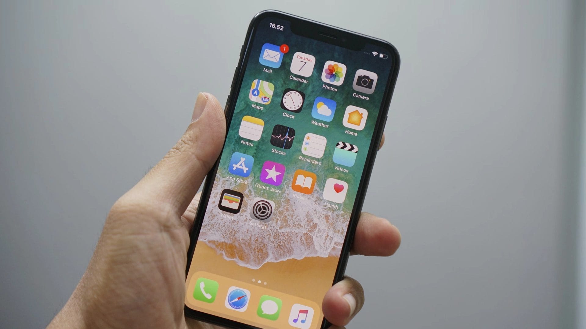 Close-Up Of A Hand Holding An Apple Iphone.