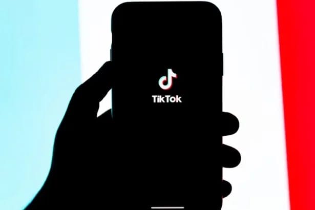 Tiktok Logo Visible On An Iphone Display