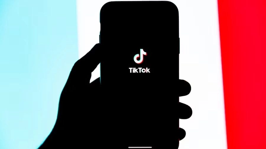 Tiktok Logo Visible On An Iphone Display